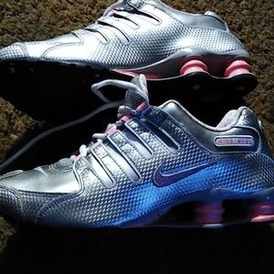 Pink and silver Nike shocks